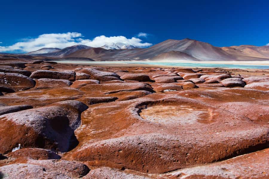 Caracoles: Red Stones of Atacama and Chaxa Guided Day Trip - Red Stones and the Aguas Calientes saltflat