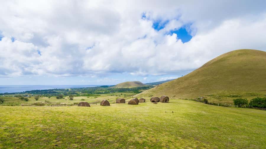 Easter Island: Full Day Ancestral Caves and Orongo Village - Ahu Akivi brings the seven explorers into view