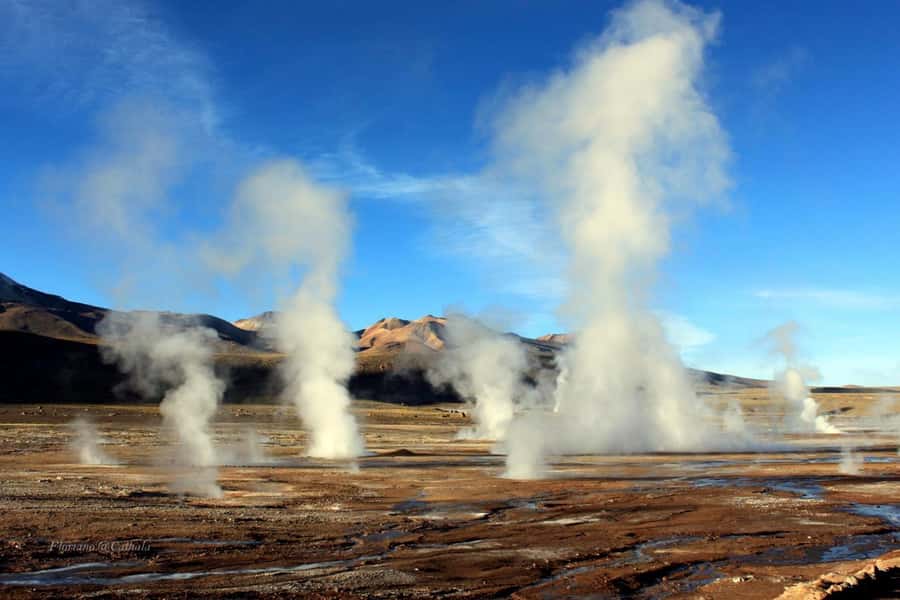 From San Pedro de Atacama: Tatio Geysers and Machuca Tour - Walking among the geysers at sunrise