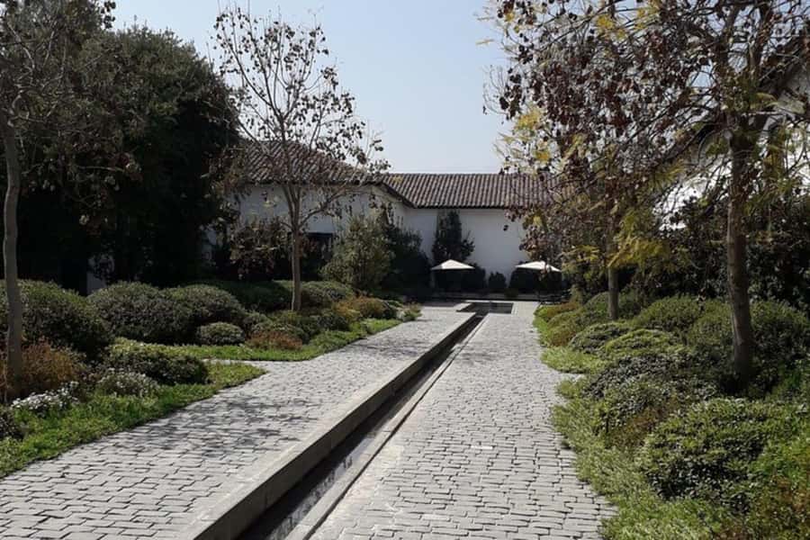 Santiago de Chile: Half-Day City Tour with Local Cuisine - Pace, walking, and who should book